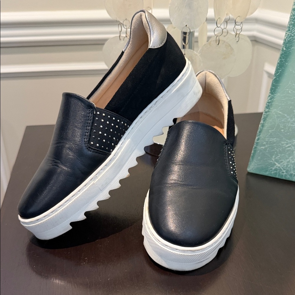 Clarks Tansy Black Leather and Silver Accent Slip-On Platform Sneakers